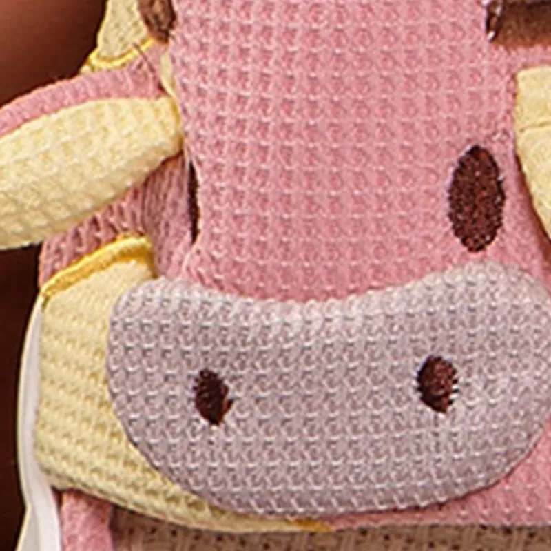 Moo-ve Into Comfort with Cozy Cow Slippers!